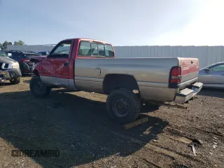 1997 Dodge 2500 with VIN 1B7KF26Z7VJ563055, listed as a Copart auction lot 66916434 with 235,006 mi miles and Salvage Title. Bid and sale history available at DreamBid. Image 2.