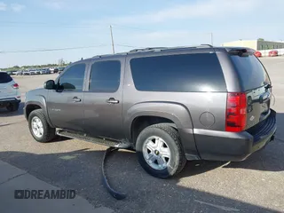 2011 Chevrolet Suburban LT with VIN 1GNSKJE34BR242629, listed as a IAAI auction lot 42043276 with 197,722 mi miles. Bid and sale history available at carsss.com. Image 14.
