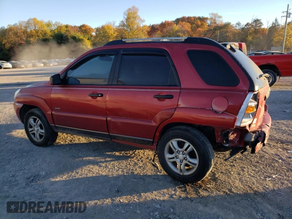 2005 Kia Sportage LX with VIN KNDJE723X57054667, listed as a Copart auction lot 77134794 with 159,748 mi miles and Salvage Title. Bid and sale history available at carsss.com. Image 2.