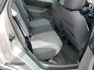 2006 Ford Focus S with VIN 1FAHP34N56W109006, listed as a Copart auction lot 53987745 with 111,677 mi miles and Salvage Title. Bid and sale history available at carsss.com. Image 10.