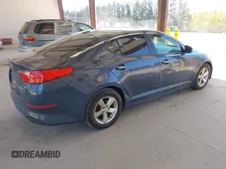 2015 Kia Optima LX with VIN KNAGM4A70F5592109, listed as a IAAI auction lot 42053533 with 159,401 mi miles. Bid and sale history available at carsss.com. Image 4.