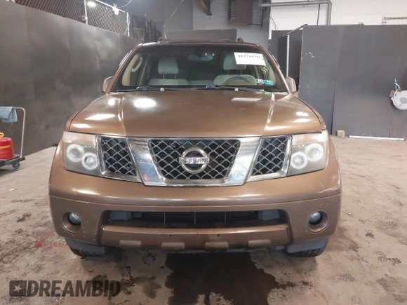 2005 Nissan Pathfinder SE z VIN 5N1AR18W65C703936, wystawiony jako IAAI lot #41271670 z przebiegiem 129 744 mil mil oraz . Historia ofert i sprzedaży dostępna na DreamBid. Obrazek 12.