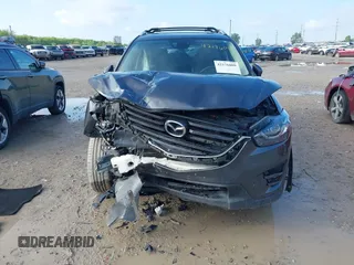 2016 Mazda CX-5 Grand Touring with VIN JM3KE4DYXG0724183, listed as a IAAI auction lot 42176009 with 152,695 mi miles and . Bid and sale history available at DreamBid. Image 6.