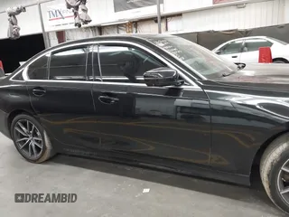 2020 BMW 3 Series 330i xDrive with VIN 3MW5R7J09L8B07302, listed as a IAAI auction lot 42592023 with 60,724 mi miles and . Bid and sale history available at DreamBid. Image 13.