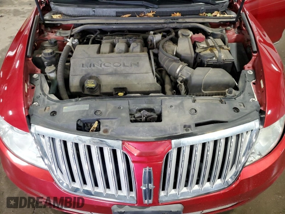 2010 Lincoln MKS z VIN 1LNHL9DR6AG614417, wystawiony jako Copart lot #54328705 z przebiegiem 124 443 mil mil oraz Szkoda całkowita • Salvage title. Historia ofert i sprzedaży dostępna na DreamBid. Obrazek 11.