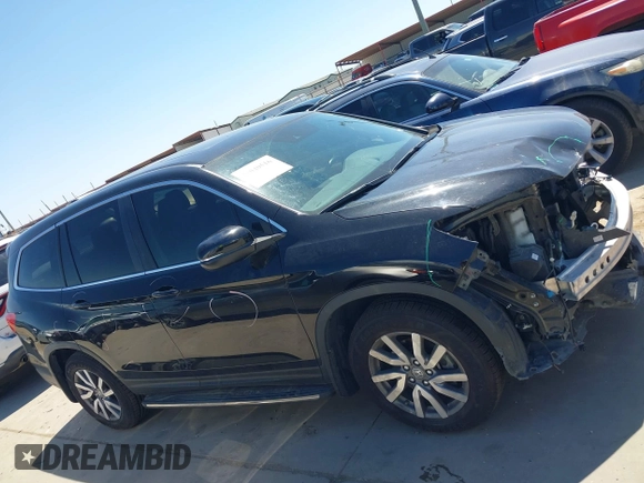 2019 Honda Pilot EX-L with VIN 5FNYF5H56KB042918, listed as a IAAI auction lot 42040516 with 113,433 mi miles and . Bid and sale history available at DreamBid. Image 14.