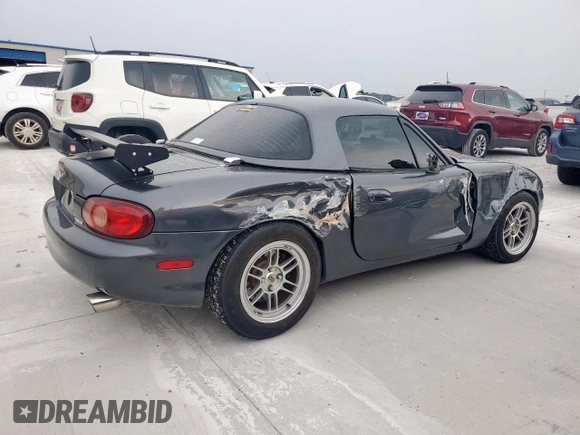 2001 Mazda MX-5 Miata with VIN JM1NB353210210976, listed as a Copart auction lot 59653695 with 152,250 mi miles and Salvage title. Bid and sale history available at DreamBid. Image 3.