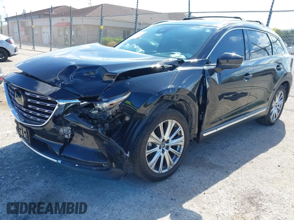 2021 Mazda CX-9 Signature with VIN JM3TCBEY1M0539786, listed as a IAAI auction lot 42264611 with 51,168 mi miles and . Bid and sale history available at DreamBid. Image 2.