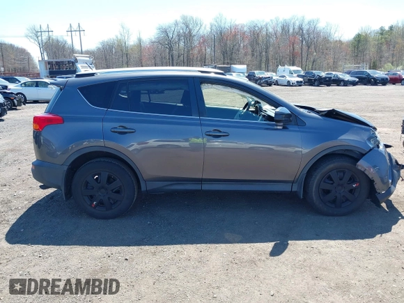2015 Toyota RAV4 LE with VIN JTMBFREV4FJ037989, listed as a IAAI auction lot 42063957 with 93,201 mi miles and . Bid and sale history available at DreamBid. Image 13.