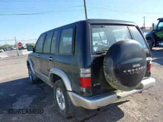 2000 Isuzu Trooper S with VIN JACDJ58X7Y7J06010, listed as a IAAI auction lot 42002763 with 165,285 mi miles and . Bid and sale history available at DreamBid. Image 3.