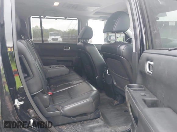 2015 Honda Pilot Touring with VIN 5FNYF4H9XFB036493, listed as a IAAI auction lot 42190624 with 223,675 mi miles and . Bid and sale history available at DreamBid. Image 8.