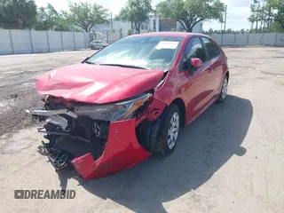 2021 Toyota Corolla LE with VIN 5YFEPMAE4MP168772, listed as a IAAI auction lot 39918982 with 84,699 mi miles. Bid and sale history available at carsss.com. Image 2.