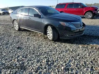 2015 Lincoln MKS z VIN 1LNHL9DK7FG600858, wystawiony jako Copart lot #46167275 z przebiegiem 208 674 mil mil oraz Szkoda całkowita • Salvage title. Historia ofert i sprzedaży dostępna na DreamBid. Obrazek 13.