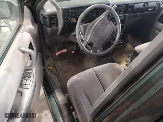 1993 Dodge Caravan Grand SE with VIN 1B4GH44R2PX757679, listed as a Copart auction lot 43034645 with 311,322 mi miles and Salvage Title. Bid and sale history available at carsss.com. Image 8.