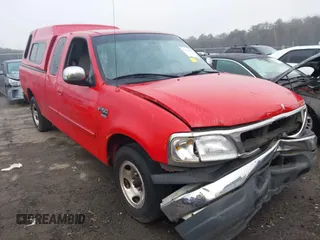 1999 Ford F-150 z VIN 1FTRX17WXXNA90516, wystawiony jako IAAI lot #41787426 z przebiegiem 354 066 mil mil oraz . Historia ofert i sprzedaży dostępna na DreamBid. Obrazek 13.