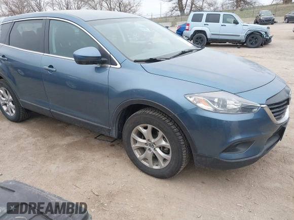 2015 Mazda CX-9 Touring with VIN JM3TB3CA1F0459163, listed as a IAAI auction lot 41965654 with 35,847 mi miles. Bid and sale history available at carsss.com. Image 1.