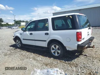 1997 Ford Expedition XLT with VIN 1FMEU17L2VLB74797, listed as a Copart auction lot 61377745 with 236,140 mi miles and Salvage title. Bid and sale history available at DreamBid. Image 2.