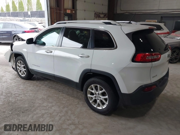 2014 Jeep Cherokee Altitude with VIN 1C4PJMCB7EW186432, listed as a IAAI auction lot 42076018 with 150,186 mi miles and . Bid and sale history available at DreamBid. Image 3.