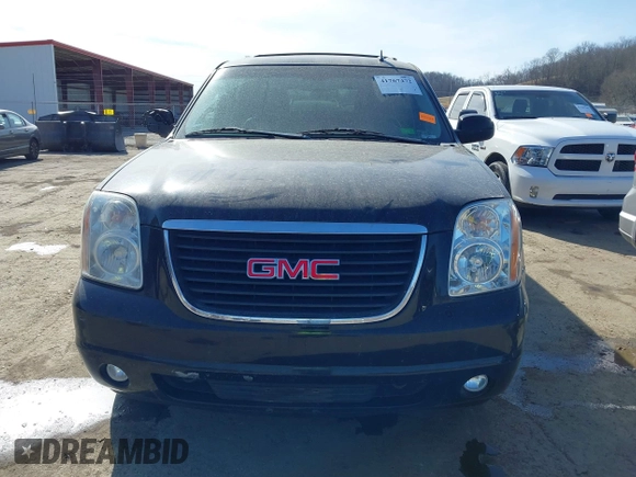 2014 GMC Yukon XL SLT with VIN 1GKS2KE79ER238831, listed as a IAAI auction lot 41767472 with 284,596 mi miles. Bid and sale history available at carsss.com. Image 12.