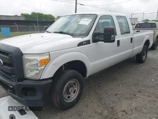 2015 Ford F-250 Lariat with VIN 1FT7W2B6XFEC33499, listed as a IAAI auction lot 42114064 with 215,314 mi miles and . Bid and sale history available at carsss.com. Image 2.