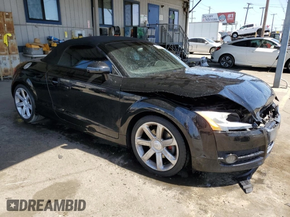 2008 Audi TT 2.0T with VIN TRUMF38J481034405, listed as a Copart auction lot 61779265 with 104,271 mi miles and Salvage title. Bid and sale history available at DreamBid. Image 4.