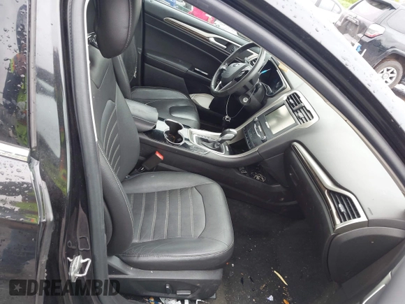 2014 Ford Fusion SE Hybrid with VIN 3FA6P0LU9ER310990, listed as a IAAI auction lot 42336303 with 197,588 mi miles and . Bid and sale history available at DreamBid. Image 5.