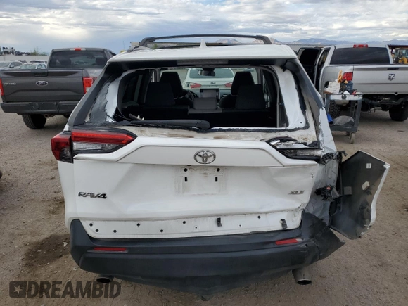2019 Toyota RAV4 XLE with VIN 2T3W1RFVXKW043919, listed as a Copart auction lot 52998715 with 55,593 mi miles and Salvage Title. Bid and sale history available at carsss.com. Image 6.