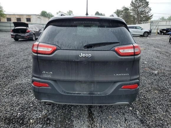 2016 Jeep Cherokee Limited with VIN 1C4PJMDBXGW261559, listed as a Copart auction lot 60042415 with 94,637 mi miles and Salvage title. Bid and sale history available at DreamBid. Image 6.