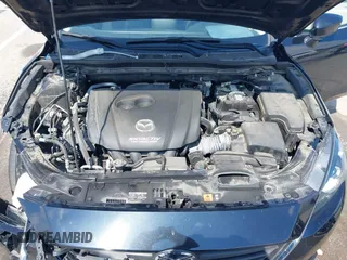 2016 Mazda 3 i Sport z VIN 3MZBM1U77GM305672, wystawiony jako IAAI lot #42237533 z przebiegiem 79 752 mil mil oraz . Historia ofert i sprzedaży dostępna na DreamBid. Obrazek 10.