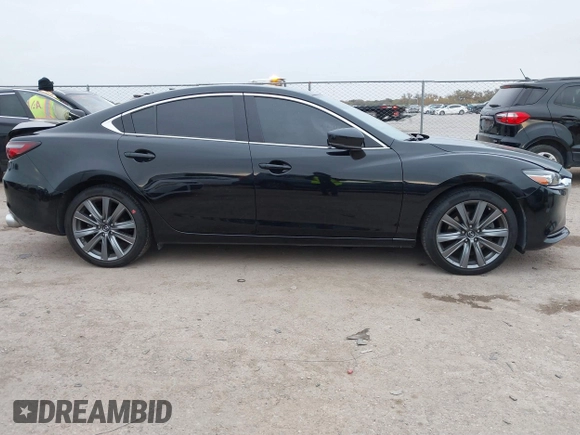 2020 Mazda 6 Grand Touring with VIN JM1GL1TY5L1513949, listed as a IAAI auction lot 40953540 with 55,616 mi miles and . Bid and sale history available at DreamBid. Image 13.