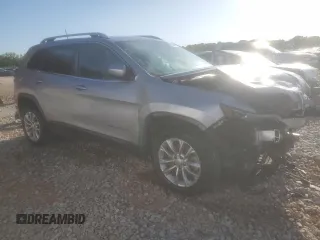 2019 Jeep Cherokee Latitude with VIN 1C4PJLCX4KD110812, listed as a Copart auction lot 52508065 with 126,861 mi miles and Salvage title. Bid and sale history available at DreamBid. Image 4.