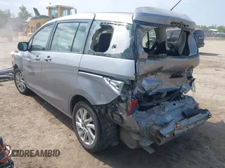 2014 Mazda 5 Sport with VIN JM1CW2BL6E0164195, listed as a IAAI auction lot 42455158 with 155,007 mi miles and . Bid and sale history available at DreamBid. Image 3.