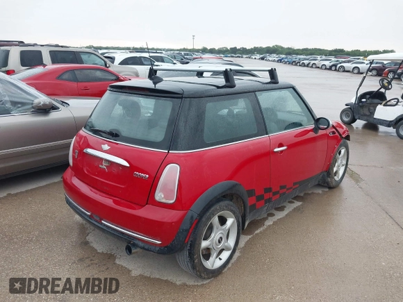 2005 MINI Hardtop with VIN WMWRC33415TJ67372, listed as a IAAI auction lot 42120875 with 153,727 mi miles and . Bid and sale history available at DreamBid. Image 4.