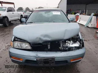 1994 Honda Accord EX w/Leather with VIN 1HGCD5657RA119657, listed as a IAAI auction lot 41528165 with 119,458 mi miles. Bid and sale history available at carsss.com. Image 12.
