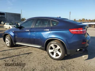 2014 BMW X6 50i z VIN 5UXFG8C53EL592803, wystawiony jako Copart lot #79621904 z przebiegiem 154 595 mil mil oraz Szkoda całkowita • Salvage title. Historia ofert i sprzedaży dostępna na DreamBid. Obrazek 2.