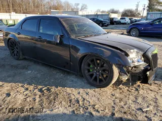 2006 Chrysler 300 C SRT8 with VIN 2C3LA73W56H450447, listed as a Copart auction lot 45502875 with 130,728 mi miles and Salvage Title. Bid and sale history available at carsss.com. Image 4.