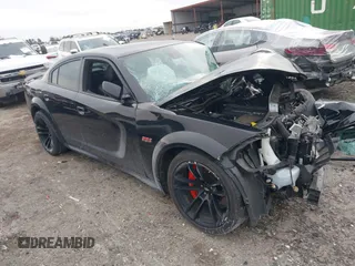 2022 Dodge Charger Scat Pack Widebody with VIN 2C3CDXGJXNH101398, listed as a IAAI auction lot 41408112 with 72,625 mi miles and . Bid and sale history available at carsss.com. Image 1.