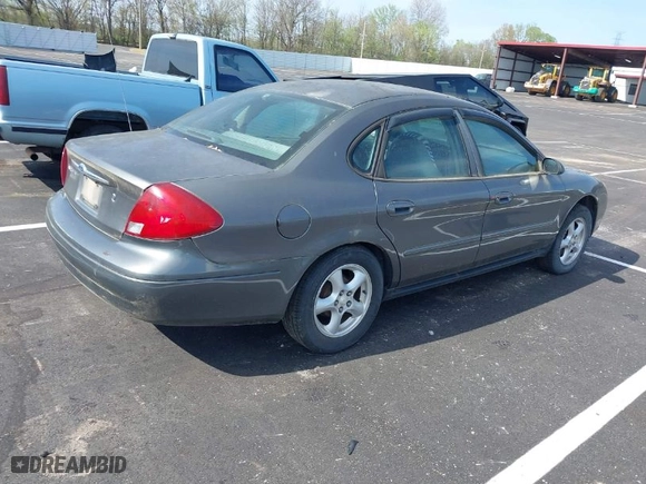 2003 Ford Taurus SE Standard with VIN 1FAFP53U73A172449, listed as a IAAI auction lot 41933160 with 230,002 mi miles. Bid and sale history available at carsss.com. Image 4.
