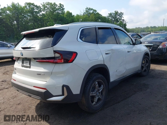 2023 BMW X1 xDrive28i with VIN WBX73EF03P5X21780, listed as a IAAI auction lot 42366909 with 14,673 mi miles and . Bid and sale history available at DreamBid. Image 4.