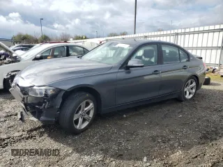 2014 BMW 3 Series 328i with VIN WBA3C1C50EK114784, listed as a Copart auction lot 49279505 with 128,652 mi miles and Salvage Title. Bid and sale history available at carsss.com. Image 1.