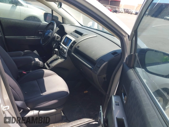 2009 Mazda 5 Sport with VIN JM1CR293990334438, listed as a IAAI auction lot 42561953 with 118,178 mi miles and . Bid and sale history available at DreamBid. Image 5.