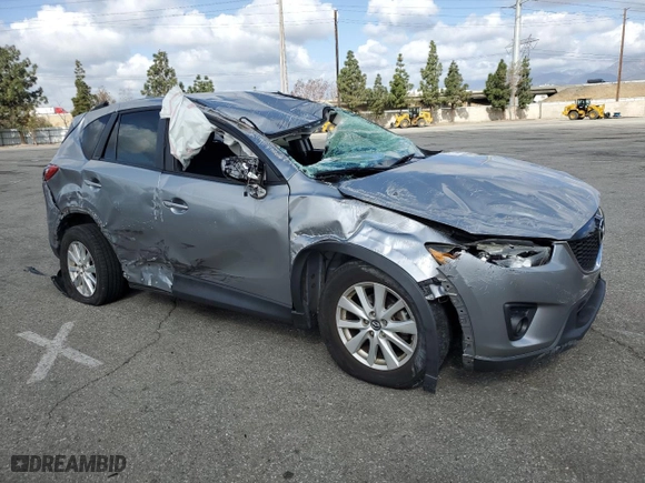 2014 Mazda CX-5 Touring with VIN JM3KE2CYXE0320996, listed as a Copart auction lot 51366485 with 102,472 mi miles and Salvage Title. Bid and sale history available at carsss.com. Image 4.