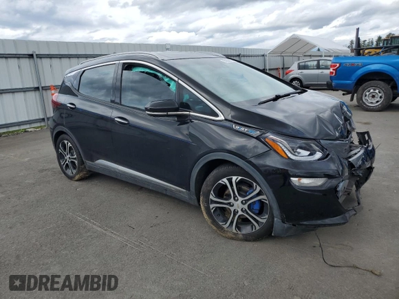 2018 Chevrolet Bolt EV Premier with VIN 1G1FX6S09J4122445, listed as a Copart auction lot 55230635 with 33,569 mi miles and Salvage title. Bid and sale history available at DreamBid. Image 4.