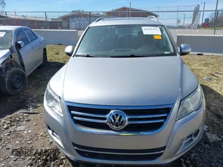 2011 Volkswagen Tiguan SE with VIN WVGBV7AX9BW509353, listed as a IAAI auction lot 41645315 with 112,283 mi miles and . Bid and sale history available at DreamBid. Image 6.