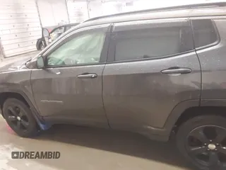 2018 Jeep Compass Altitude with VIN 3C4NJDBB6JT187581, listed as a IAAI auction lot 41542689 with 126,147 mi miles and . Bid and sale history available at carsss.com. Image 14.