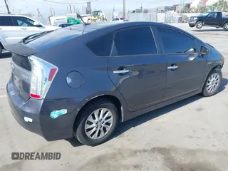 2014 Toyota Prius with VIN JTDKN3DPXE3054379, listed as a IAAI auction lot 42080665 with Not provided miles and . Bid and sale history available at DreamBid. Image 4.