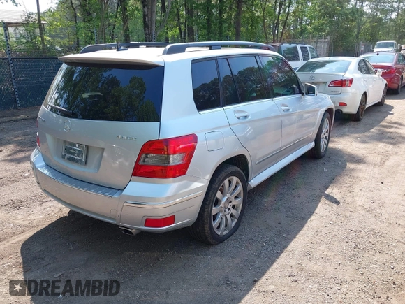 2010 Mercedes-Benz GLK GLK 350 with VIN WDCGG8HB4AF399020, listed as a IAAI auction lot 42180015 with 313,310 mi miles. Bid and sale history available at carsss.com. Image 4.