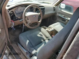 2001 Ford Explorer Sport z VIN 1FMYU60E31UA70006, wystawiony jako Copart lot #56430155 z przebiegiem 194 924 mil mil oraz Czysty tytuł • Clean title. Historia ofert i sprzedaży dostępna na DreamBid. Obrazek 8.
