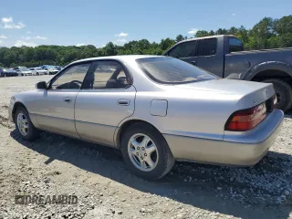 1996 Lexus ES 300 z VIN JT8BF12G6T0185858, wystawiony jako Copart lot #57978925 z przebiegiem 153 841 mil mil oraz Czysty tytuł • Clean title. Historia ofert i sprzedaży dostępna na DreamBid. Obrazek 2.