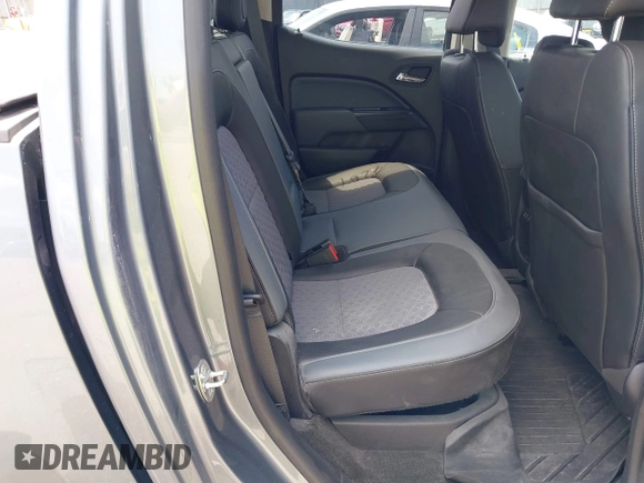 2018 Chevrolet Colorado 4WD Z71 with VIN 1GCGTDENXJ1247717, listed as a IAAI auction lot 42557264 with 91,463 mi miles and . Bid and sale history available at DreamBid. Image 8.